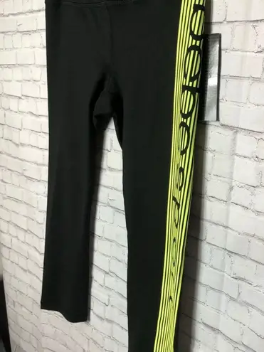 Bebe Sport Neon Yellow Side Stripe On Black Capri