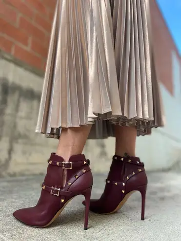 Valentino Garavani Valentino Rockstud pointy toe harness ankle boot in wine calfskin leather IT 36