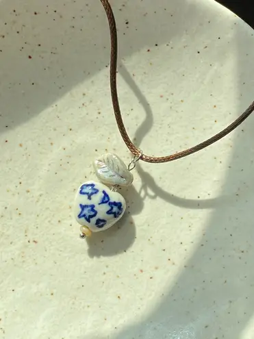 Handmade celestial porcelain heart bead & Czech leaf unique boho fairy whimsical necklace🌙🌀🌟