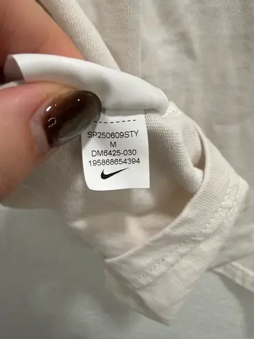 Nike  cream white embroidered logo shirt