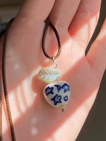 Handmade celestial porcelain heart bead & Czech leaf unique boho fairy whimsical necklace🌙🌀🌟