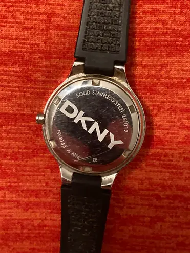 DKNY Woman’s stainless steel quartz  dainty little wrist watch!