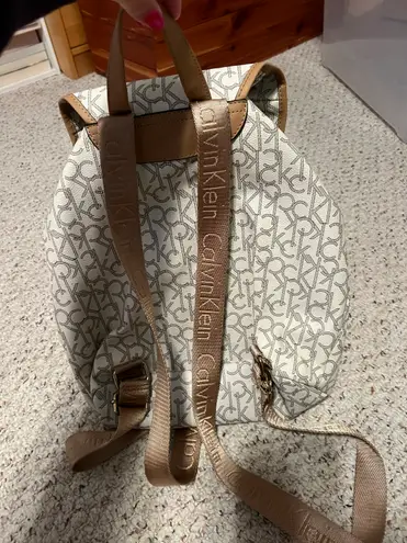 Calvin Klein brown and white backpack