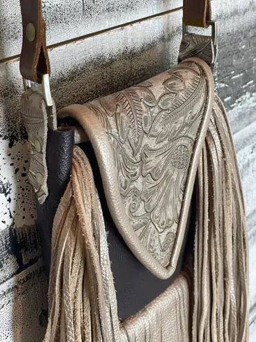 Deep brown and golden browns are stunning on this leather crossbody purse.