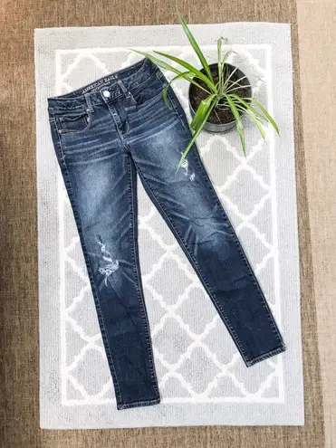 American Eagle Distressed Mid Rise Skinny Jean