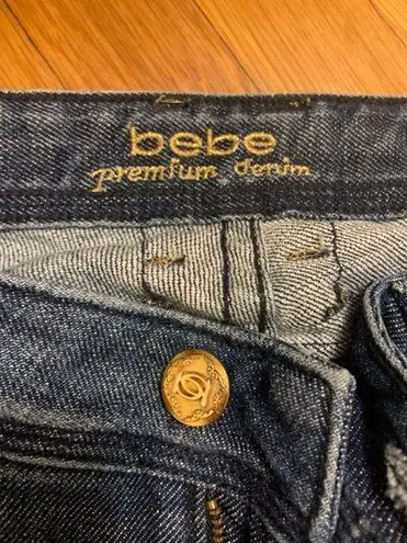 Bebe flare jeans with gold pockets