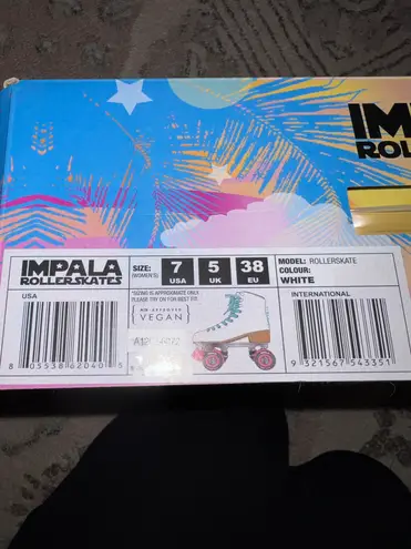 Impala White/Blue Rollerskates