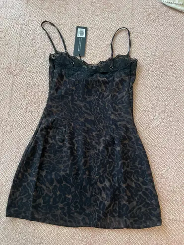 White Fox Boutique Sing Me A Lullaby Mini Dress Leopard