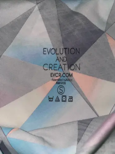 Evolution and creation  Cropped Leggings