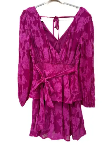 Band of the Free KISS ME FUCHSIA PEPLUM
MINI DRESS, faux wrap front, V back Pink Size M