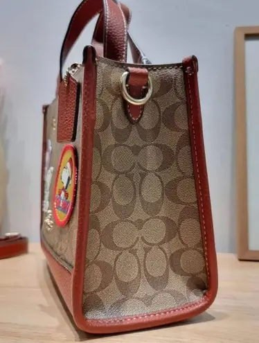 Coach  X Peanuts Dempsey Tote 22 In Signature Canvas With Patches CE851