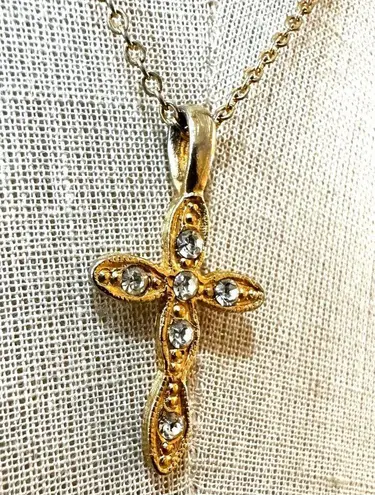Gold tone faux diamond cross pendant necklace