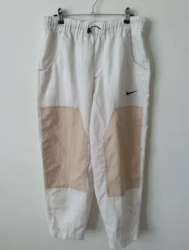 Nike NWT  Swoosh woven high waist paneled pants in cream M