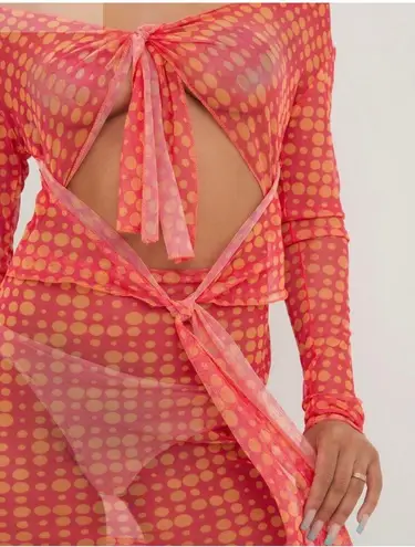 EGO LONG SLEEVE KNOTTED CUT OUT DETAIL MINI BODYCON DRESS IN PINK SPOTTY MESH