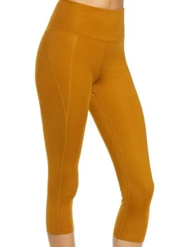 Girlfriend Collective Pocket Crop High Waisted Leggings in Saddle