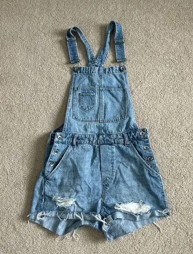 H&M  distressed blue short overalls in size 4