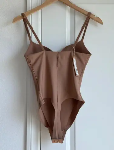 SKIMS Ultimate Body Push Up Thong Bodysuit in Siena, Size Small