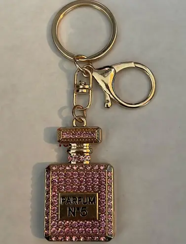 New BLING pink colored rhinestones in gold tone perfume bottle