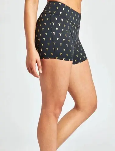 Oiselle Gold Mettle short shorts, with metallic medal pattern size medium