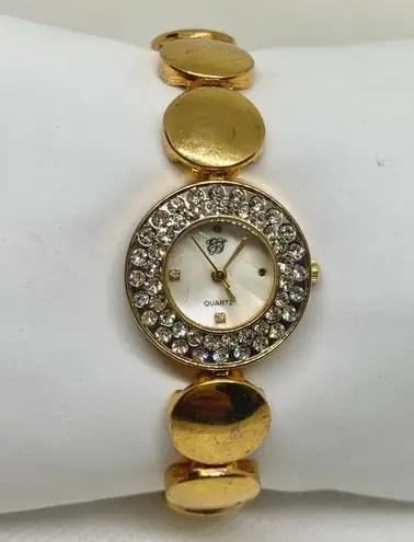 Elizabeth Taylor women gold tone watch 24mm round mop dial up to 7.5” running