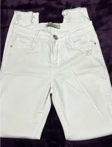 Rjonaco Denim Distressed Skinny Jeans