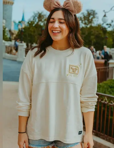 Disney  Parks Spirit Pixie Dust Metallic Jersey Long Sleeve Shirt in Cream - Image 1