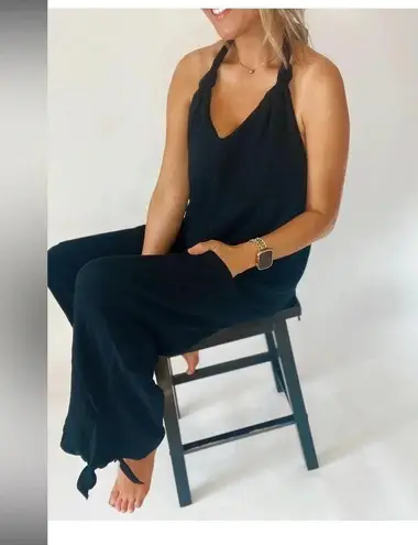 Flirty & Free Jumpsuit with cut out back, in black Size M