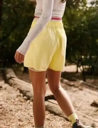 Free People Movement In the Wild Shorts in Glow Yellow