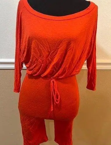 Fashion love orange one piece jumper. Size small spandex material