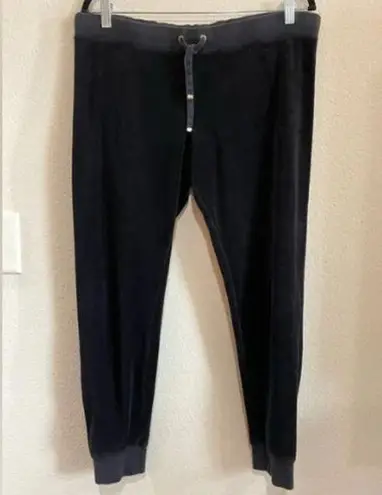 Juicy Couture  Soft velvety black slightly flared pants joggers