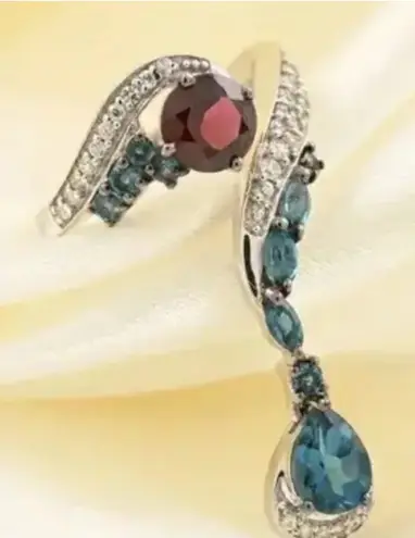 Orissa 925 Sterling Silver London Blue Topaz and Rhodolite Garnet Ring. Sz 8.75