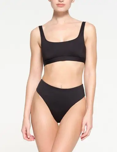 SKIMS SIGNATURE SWIM TANK BIKINI TOP SIZE LARGE ( sold out)