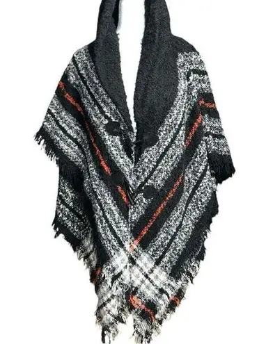 Black poncho with white and ted plaid design. Not a hoodie but a high collar! Size undefined