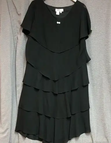 Patra woman 18 W Black sheer chiffon layers on a black sheath dress. Small bow Size 18W