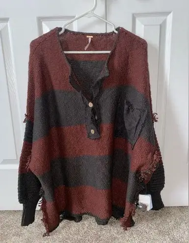 Free People cute oversized  sweater! Shorter in the front and long in the back!