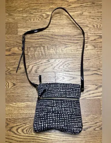 Cross body purse. New. Black and white pattern