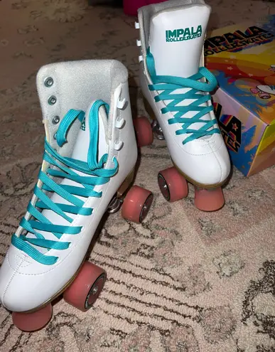 Impala White/Blue Rollerskates