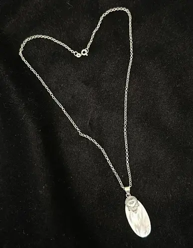 Genuine white Mother of pearl “Bali” style NWOT necklace.