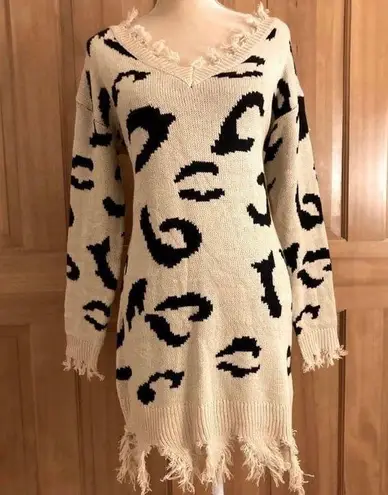 Lavishly Paris NWT, Designer Distressed Sweater Dress. Size Medium