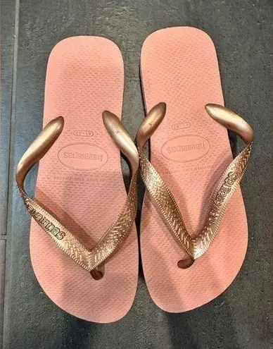 Havaianas  rose gold flip flops size 11/12