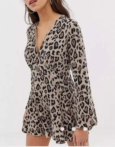 River Island Tea romper in leopard print long sleeve romper size 10UK