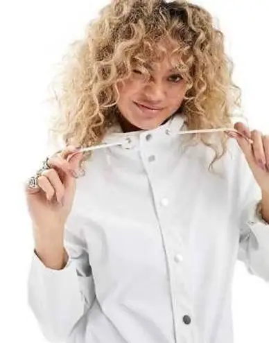 RAINS rain jacket White Size L