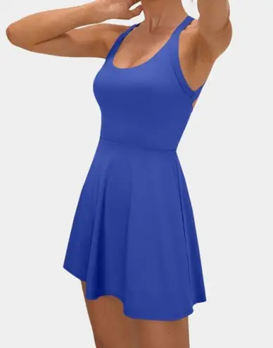 Halara NWT  Backless Twisted Active Dress-Easy Peezy Edition in Aster Blue -M  Brand new with tags. The viral athleisure dress that is cute, comfy and versatile! Size medium, which best fits an 8-10. $60 retail.