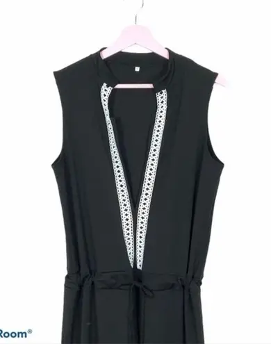 Vintage Deep V Sleeveless flare leg jumpsuit Medium Black