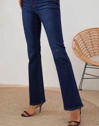 NWT Of luck Deep Blue Denim Jeans retail $99. Size 14. Super stretch!