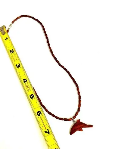 Wood beaded dolphin pendant necklace Brown