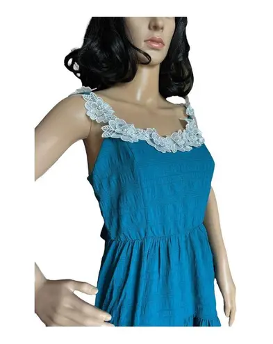 Daisy tiered smocked open back with bow high low dress size medium Blue - Image 7