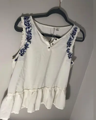 LC Lauren Conrad White sheer tank with navy blue embroidery details size large from Lauren Conrad