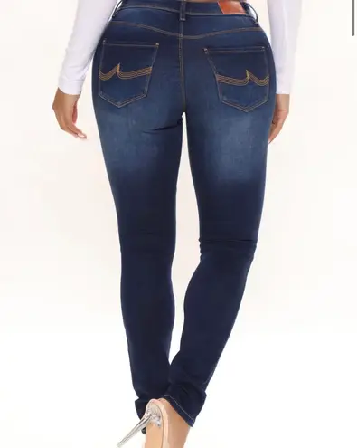 California vintage Dark Wash Mid Rise Distressed Skinny Jeans