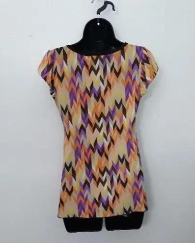 B. Wear multicolored blouse